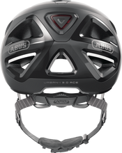 Load image into Gallery viewer, Abus Urban-I 3.0 cycle helmet product image. This view shows the back the of helmet, with the velvet black colour variant.
