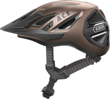 Load image into Gallery viewer, Abus Urban-I 3.0 cycle helmet product image. This view shows the side the of helmet, with the metallic copper colour variant.