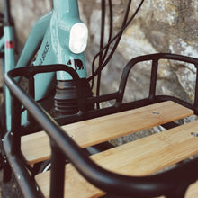 Load image into Gallery viewer, A product image showing the front rack accessory for the Kuma S2 electric bike showing a close-up of the cutout which accommodates the integrated front light.