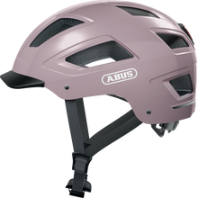 Load image into Gallery viewer, A product image of the Abus Hyban 2.0 cycle safety helmet, showing the colour option for Mellow Mauve.