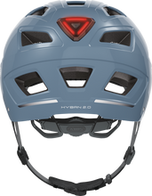 Load image into Gallery viewer, A product image of the Abus Hyban 2.0 cycle safety helmet, showing the colour option for Glacier Blue, from the back of the helmet, also showing the rear-facing LED light.