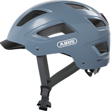 Load image into Gallery viewer, A product image of the Abus Hyban 2.0 cycle safety helmet, showing the colour option for Glacier Blue.