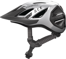 Load image into Gallery viewer, Abus Urban-I 3.0 cycle helmet product image. This view shows the side the of helmet, with the gleam silver colour variant.
