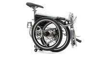 Load image into Gallery viewer, A product image of the Ahooga Power 36V folding electric bike showing the bike in its fully folded configuration. The bike's frame colour is grey. The Ahooga Power 36V folding electric bike is available to buy from Bleeper.