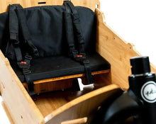 Load image into Gallery viewer, A product image showing a close-up view of the Yuba Supercargo Bamboo Box Seat Kit.
