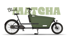 Load image into Gallery viewer, Product image of the Dolly Joy electric cargo bike with a black frame and cargo box. There is large text behind the bike describing its colour: Matcha Black.