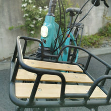 Load image into Gallery viewer, A product image showing the front rack accessory for the Kuma S2 electric bike. A close-up of the bamboo finish.