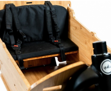 Load image into Gallery viewer, A close-up view of the seat kit for the Yuba Supercargo Bamboo Box add-on.