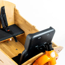 Load image into Gallery viewer, A product image showing the back side of the Yuba 2be3 child seat inside the Bamboo Box of the Yuba Supercargo CL electric cargo bike.