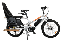 Load image into Gallery viewer, A product image of the Yuba Kombi E5 electric longtail cargo bike which can be hired from LeaseBike. The photo shows the right side of the cargo bike with a child seat and soft sport seat attached to the rear rack.