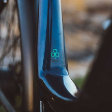 Load image into Gallery viewer, A close-up photo of the frame of a Kuma S2 electric bike showing the integrated battery.