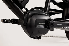 Load image into Gallery viewer, A close-up of the electric motor on the Yuba Kombi E6 electric longtail cargo bike.