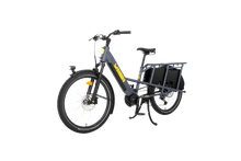 Load image into Gallery viewer, A product image showing the left side of the Yuba Boda Boda electric longtail cargo bike from an angle to the front of the bike.