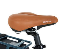 Load image into Gallery viewer, A close up of the saddle of the Beaufort Billie electric folding bike.