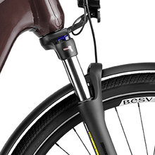 Load image into Gallery viewer, A product image of the BESV TR 1.3 electric bike, showing a close-up of the front fork suspension.