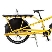 Load image into Gallery viewer, A photo of a Yuba soft spot on the back of a Yuba spicy curry cargo bike.