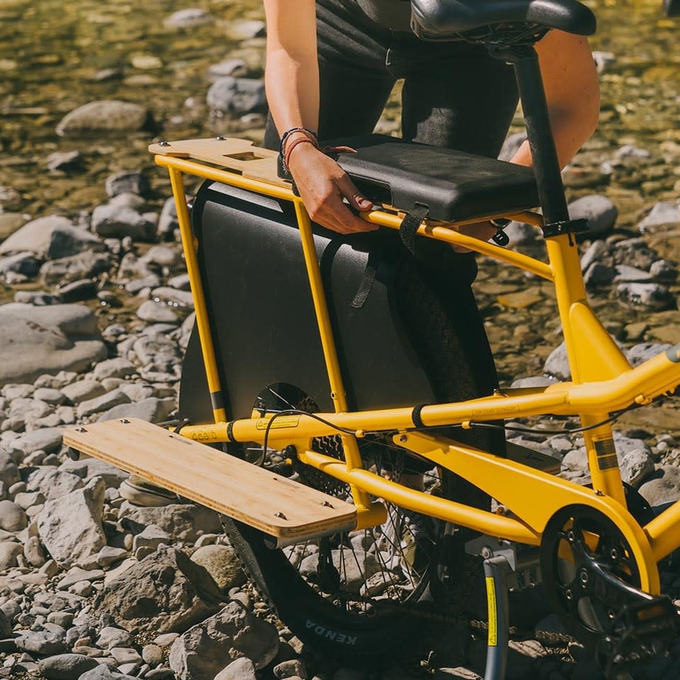 A photo of a Yuba soft spot on the back of a Yuba spicy curry cargo bike.