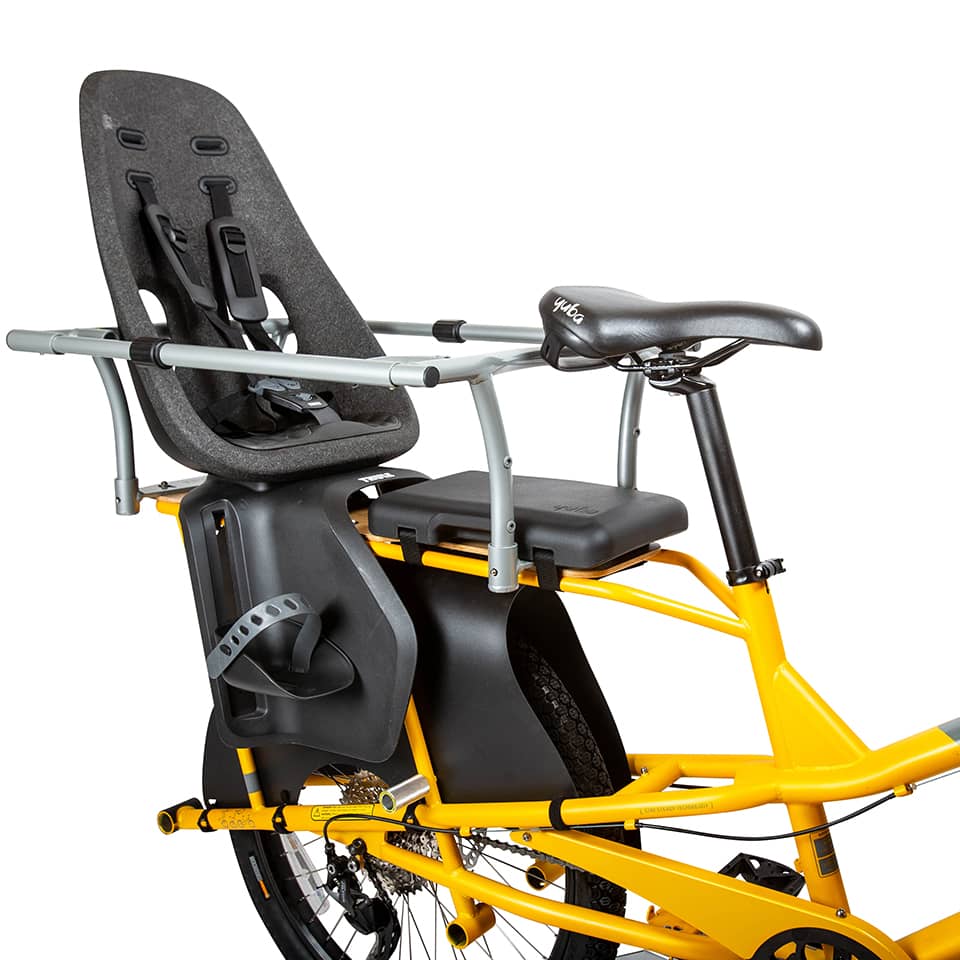 An image showing the Thule Yepp Nexxt 2 Maxi child seat installed on the rear of a Yuba longtail cargo bike.