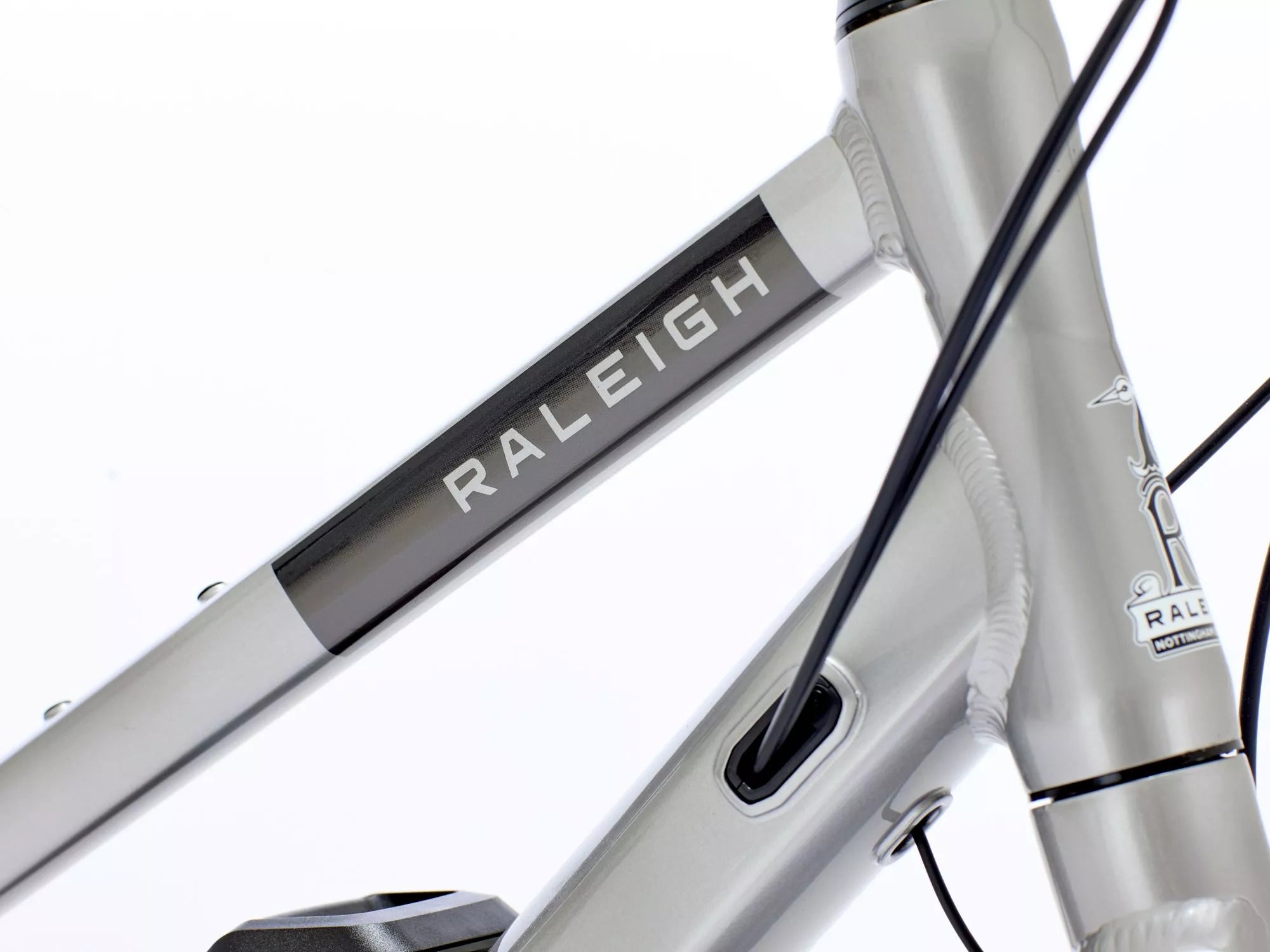 Close-up of Raleigh Captus electric bike frame showing mid-step design for urban e-bike commuting