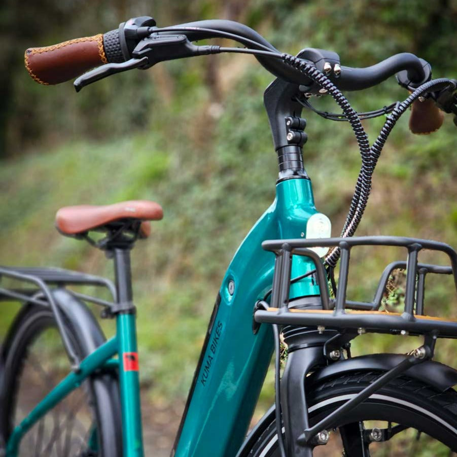 A close-up photo of the Kuma S2 electric bike showing the detail of the Emerald Green frame colour.