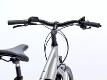 Load image into Gallery viewer, Close-up of an electric bike handlebar and front wheel on a white background.
