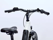 Load image into Gallery viewer, White electric bike with black handlebars and seat on a light gray background
