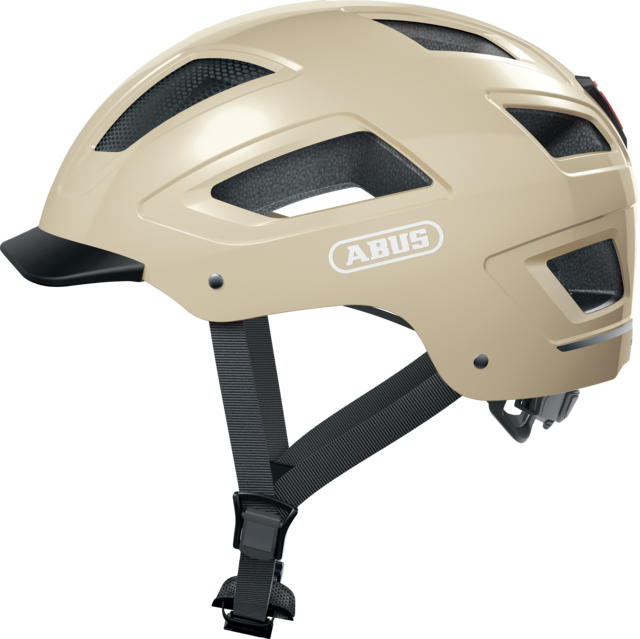 A product image of the Abus Hyban 2.0 cycle safety helmet, showing the colour option for Cannoli Cream.