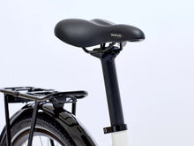 Load image into Gallery viewer, Close-up of a bicycle seat with 'Wave' branding on a light gray. background
