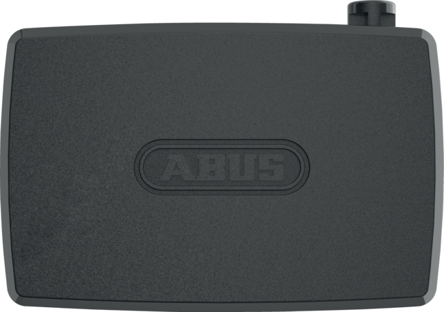 Black rectangular device with 'ABUS' branding on a white background