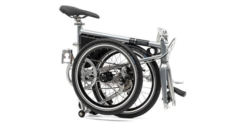 A product image of the Ahooga Power 36V folding electric bike showing the bike in its fully folded configuration. The bike's frame colour is grey. The Ahooga Power 36V folding electric bike is available to buy from Bleeper.