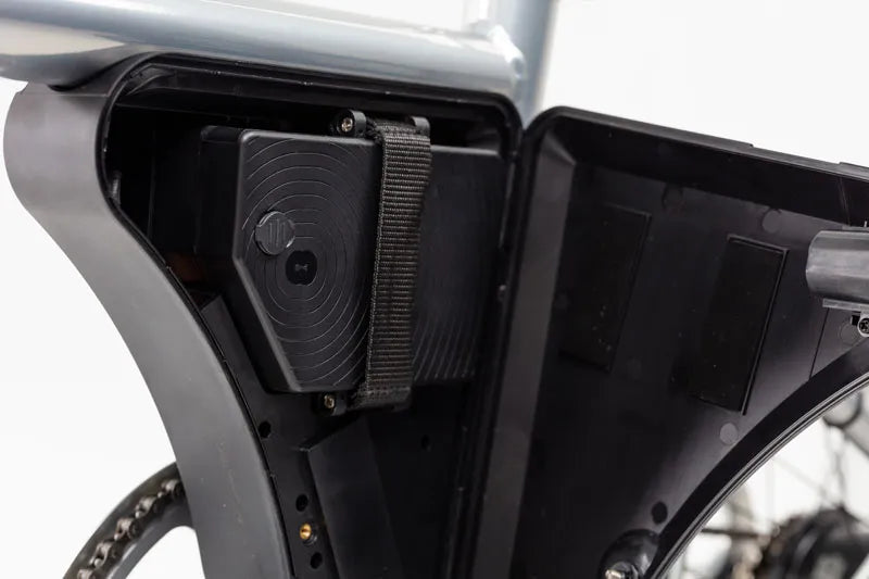A product image of the Ahooga Power 36V folding electric bike showing a close-up of the open battery box which contains the 36V battery. The Ahooga Power 36V folding electric bike is available to buy from Bleeper.