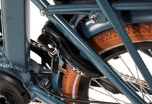 Load image into Gallery viewer, Product image of the Beaufort Billie folding electric bike with a close-up of the Axa wheel lock and key.
