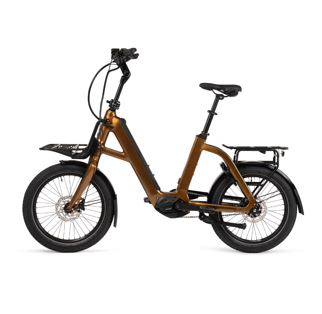 Product image of the BESV CPT 2.3 Compact Electric Bike with metallic gold frame, taken from the left side. 