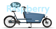 Load image into Gallery viewer, Product image of the Dolly Joy electric cargo bike with a black frame and cargo box. There is large text behind the bike describing its colour: Raspberry Blue.
