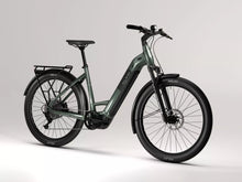 Load image into Gallery viewer, The Raleigh Novus Electric bicycle on a white background.
