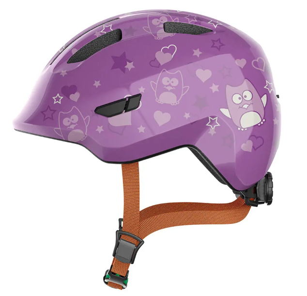 A product image of the Abus Smiley 3.0 children's bicycle helmet with the purple star colour.