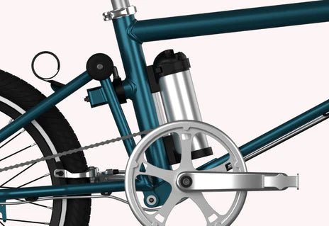 A product image of the Ahooga Active 24V folding electric bike showing a close-up of the can-shaped removable battery. The frame colour is turquoise. The Ahooga Active is available to buy from Bleeper.