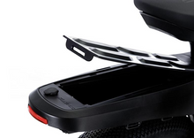 Load image into Gallery viewer, A close up photo of the rear carrier box on the Fantic Issimo Urban electric bike.
