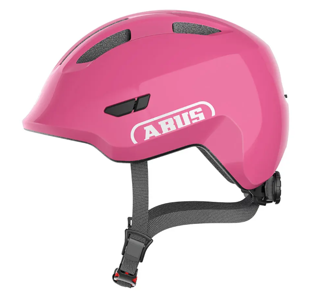 A product image of the Abus Smiley 3.0 children's bicycle helmet with the shiny pink colour.