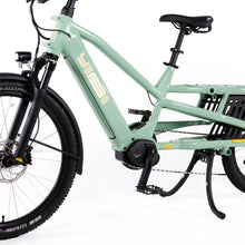 Load image into Gallery viewer, A product image of the Yuba Spicy Curry V4 electric longtail cargo bike. The frame colour is Lunar (a pale green colour) and the bike is in its basic set up, with no accessories attached. 
