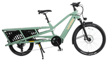 Load image into Gallery viewer, A product image of the Yuba Spicy Curry V4 electric longtail cargo bike. The frame colour is Lunar (a pale green colour) and the bike is in its basic set up, with no accessories attached. 
