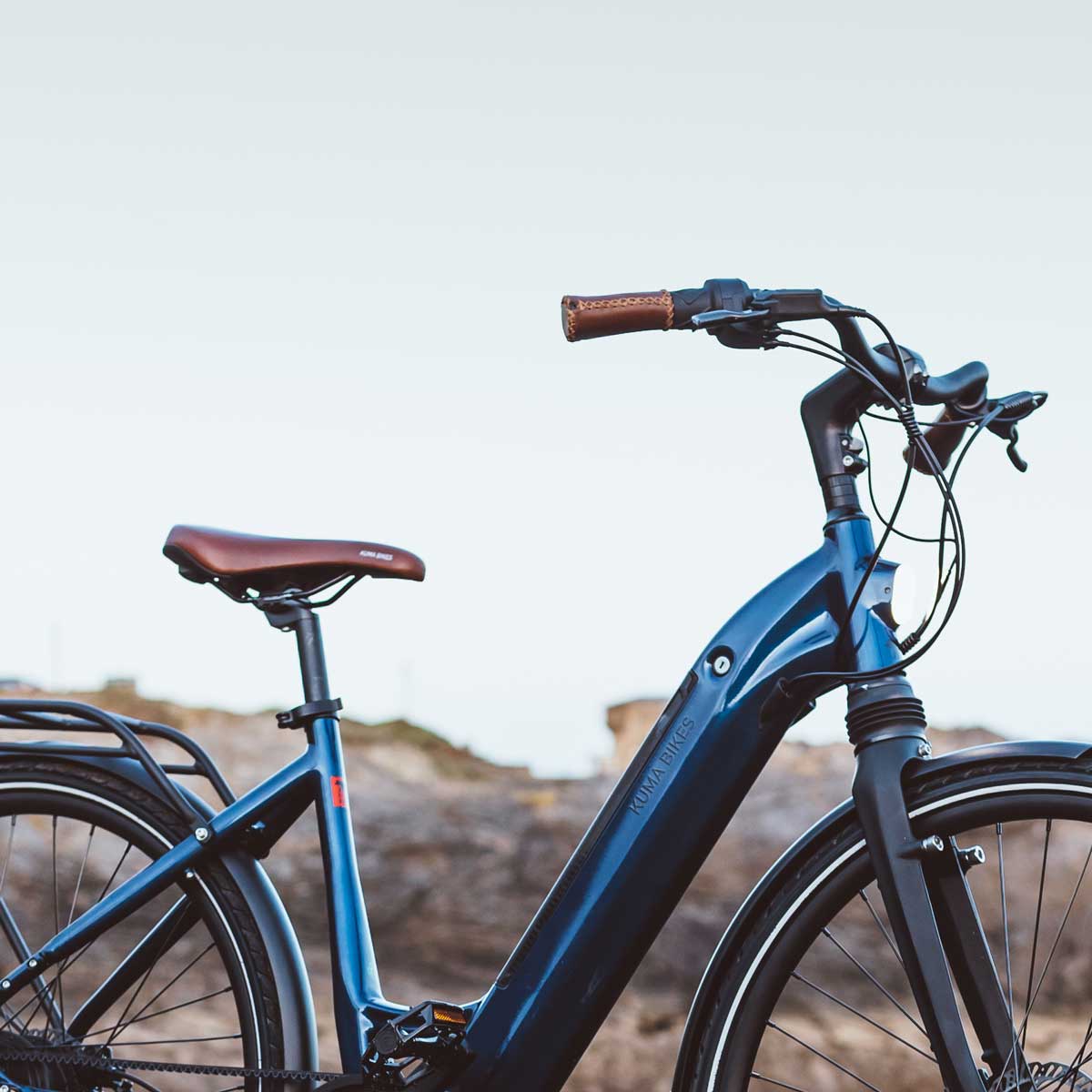 A close-up photo of the Kuma S2 electric bike displaying the Navy Metallic frame colour.