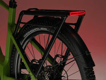 Load image into Gallery viewer, A close-up image showing the detail of the green frame colour and rear rack of a VELO DE VILLE electric bike.
