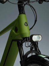 Load image into Gallery viewer, A close-up image showing the detail of the green frame colour of a VELO DE VILLE electric bike.
