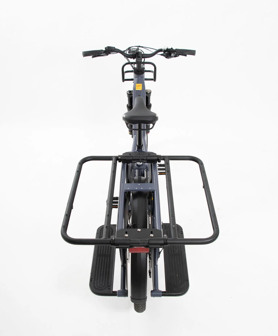 A product image showing the black Yuba Carry-All rack on the back of a Yuba Longtail electric cargo bike, without the flat tray attached. 