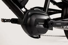Load image into Gallery viewer, A close-up of the electric motor on the Yuba Kombi E6 electric longtail cargo bike.
