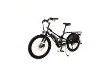 Load image into Gallery viewer, A product image of the Yuba Kombi E6 electric longtail cargo bike taken at an oblique angle from the front left of the bike. This is the bare layout of the bike, with no accessories added. The bike has a black frame. 
