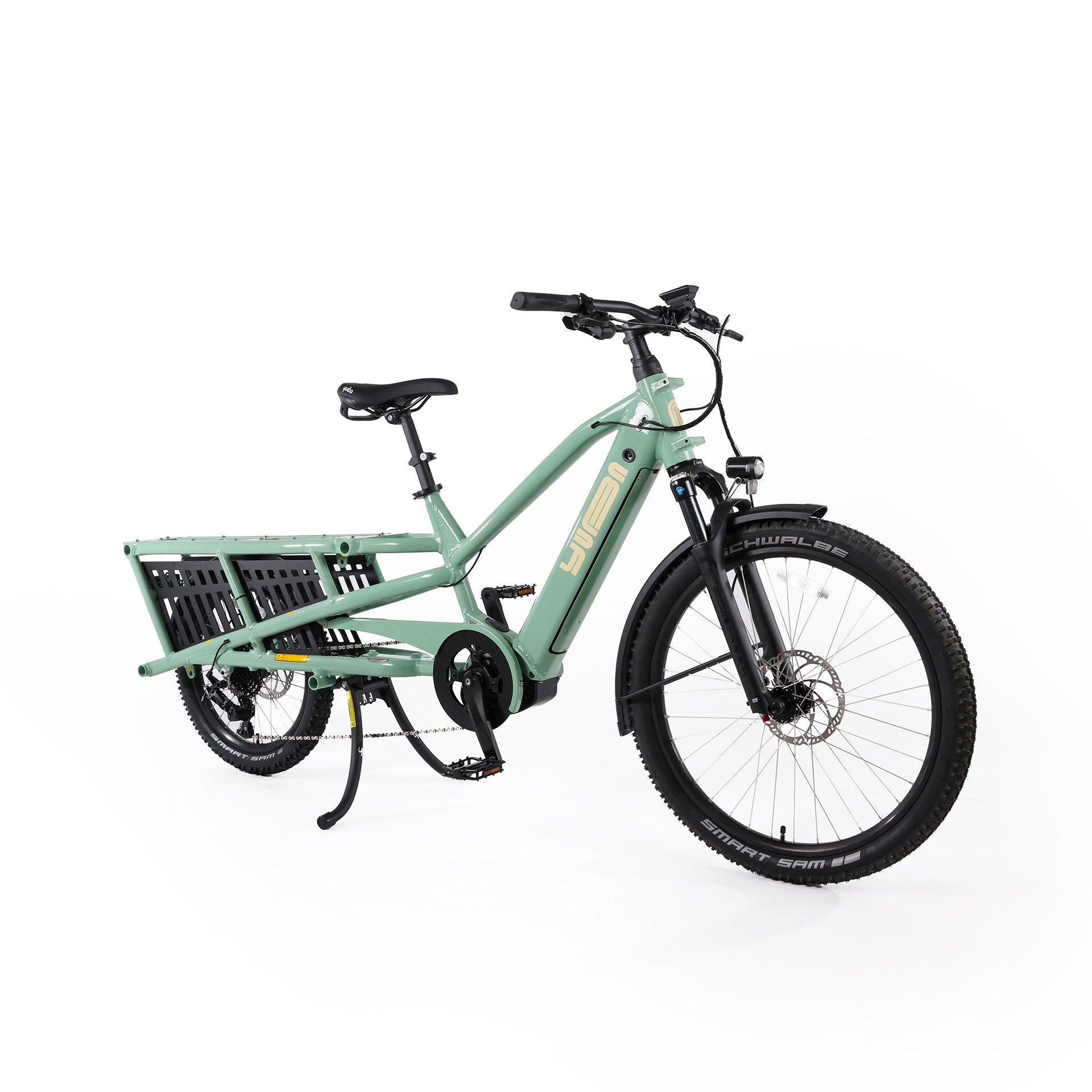 A product image of the Yuba Spicy Curry V4 electric longtail cargo bike. The frame colour is Lunar (a pale green colour) and the bike is in its basic set up, with no accessories attached. 