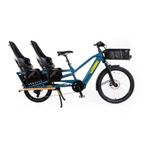 Load image into Gallery viewer, A product image of the Yuba Spicy Curry V4 electric longtail cargo bike. The frame colour is True Blue and the bike is set up with two rear child seat add-ons and a front bread basket.. 
