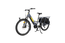 Load image into Gallery viewer, A product image showing the left side of the Yuba Boda Boda electric longtail cargo bike from an angle to the front of the bike.
